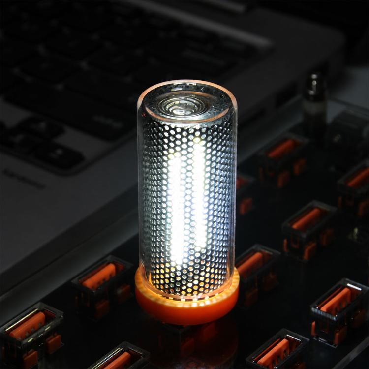 White glowing USB LED cylinder atmosphere light with dotted side grille