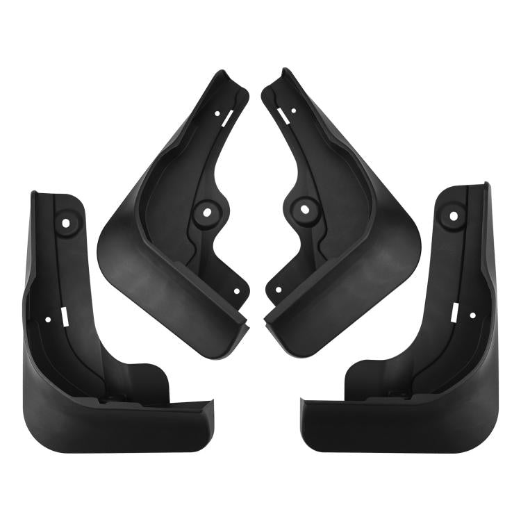 Four black car wheel splash flaps with mounting studs and V-shaped cutouts