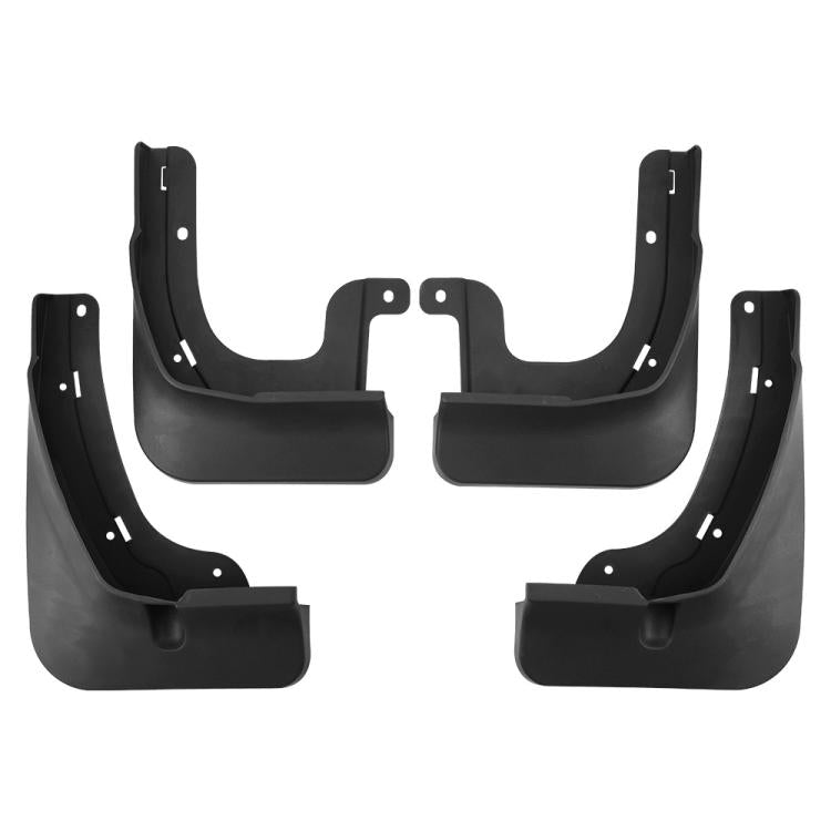 Four black wheel splash flaps (mudguards) shown as a complete set