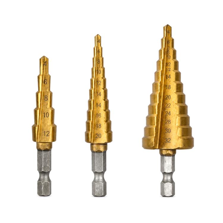 Set of three gold hex shank step drill bits with numbered steps and silver tool shanks