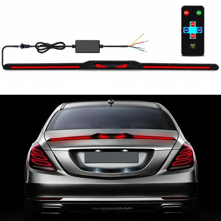 Automotive segmented spoiler light with carbon-fiber look and red brake LEDs on car