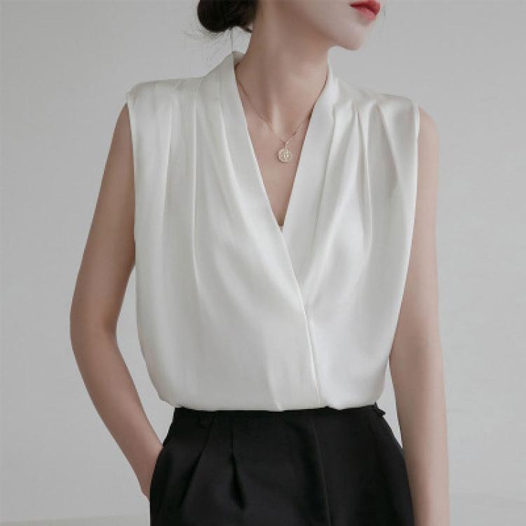 White satin V-neck sleeveless blouse with draped front and clean neckline