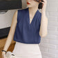 Navy sleeveless satin V-neck blouse with a relaxed drape front