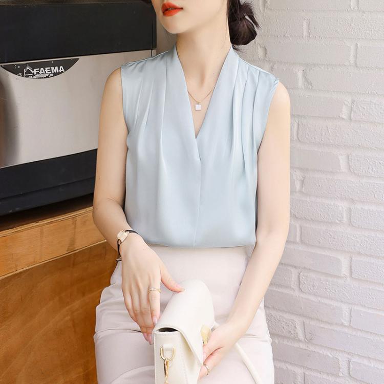 Light blue satin V-neck sleeveless blouse with soft drape front