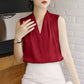 Red sleeveless satin blouse with V-neck and gathered front panel detail