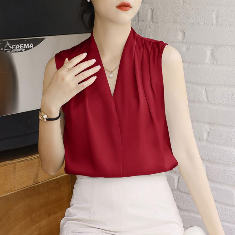 Red sleeveless satin V-neck blouse with soft drape and minimal seam lines