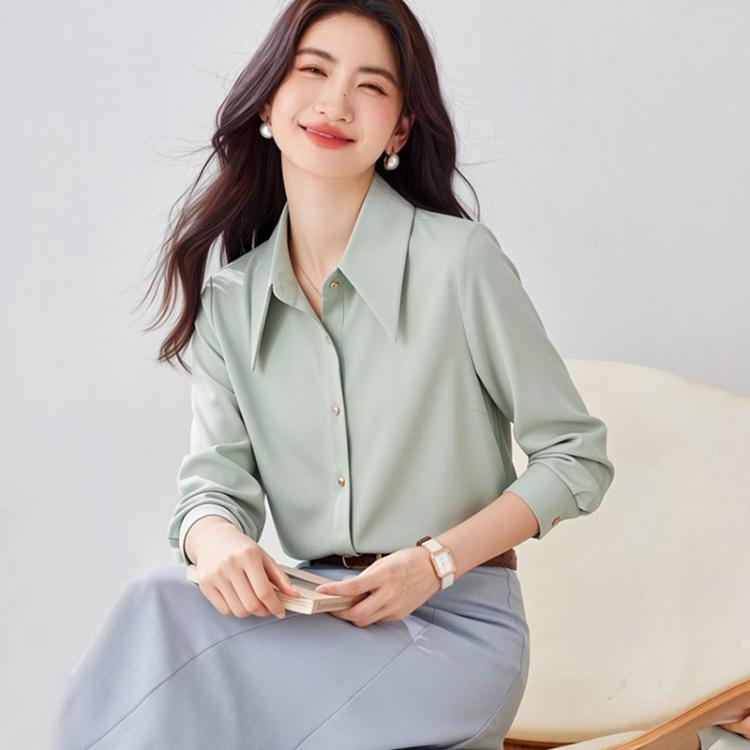 Women's satin long-sleeve blouse, light green, pointed collar and button front (posed)
