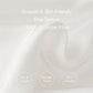 White satin fabric close-up with fine smooth sheen for a women's blouse