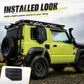 Installed black fuel tank cap cover on green SUV side panel