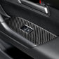 Carbon-fiber window lift panel sticker featuring black textured pattern over door switch area.