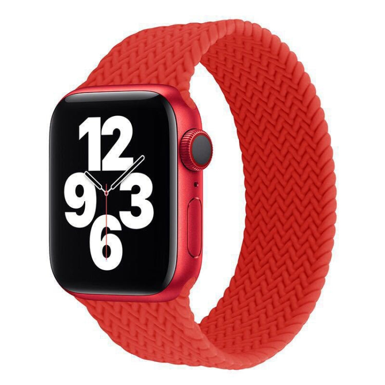 Red woven silicone watch band with smartwatch attached