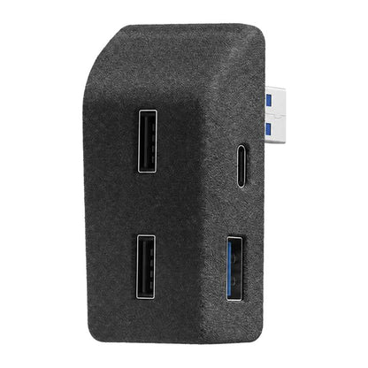 Black fabric glove box expansion hub with four USB ports, front view