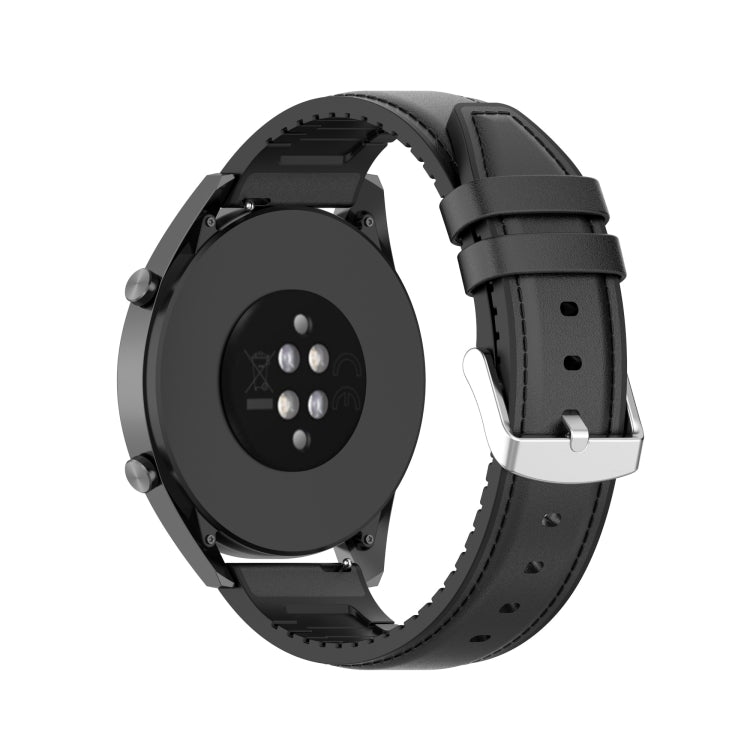 Black watch strap with perforated texture and metal buckle attachment