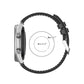 Black silicone watch strap with buckle, shown laid flat with adjustment range circle