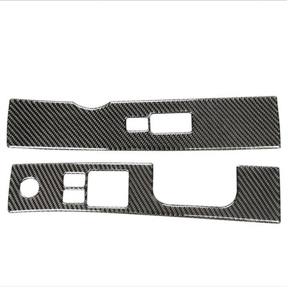 Carbon fiber-look switch panel trim sticker with rectangular cutouts and oval hole