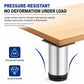 Stainless steel furniture leg supporting a wooden tabletop edge with black base ring