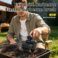 Black electric BBQ cleaning brush pressed on grill grate for scrubbing