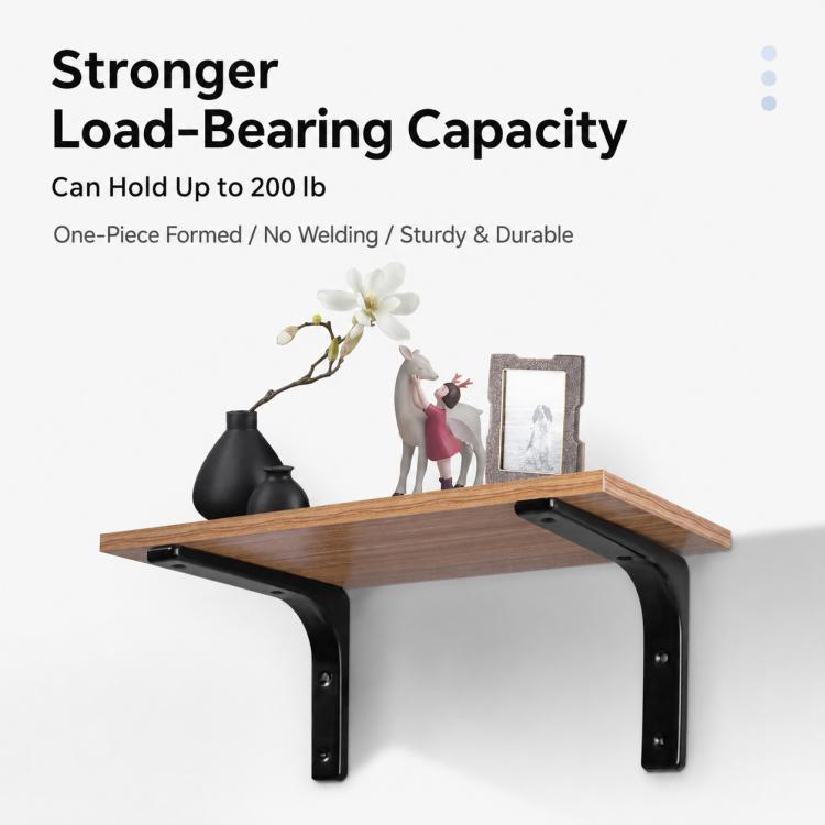 Black L-shaped wall shelf support brace with mounting screw holes, under a wooden shelf
