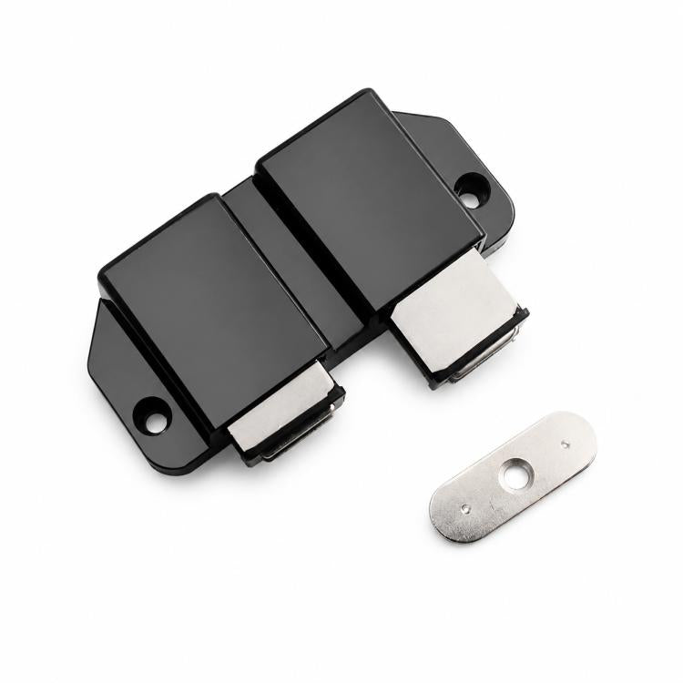 Black double magnetic cabinet door latch with two white pads and metal striker
