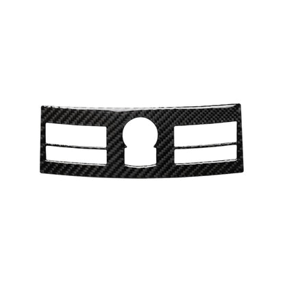 Carbon fiber-look navigation control sticker with central keyhole and side cutouts