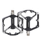 Black mountain bike pedals with dual platform and threaded axle