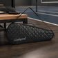 Black quilted badminton racket bag with black trim and zippered top carrying strap
