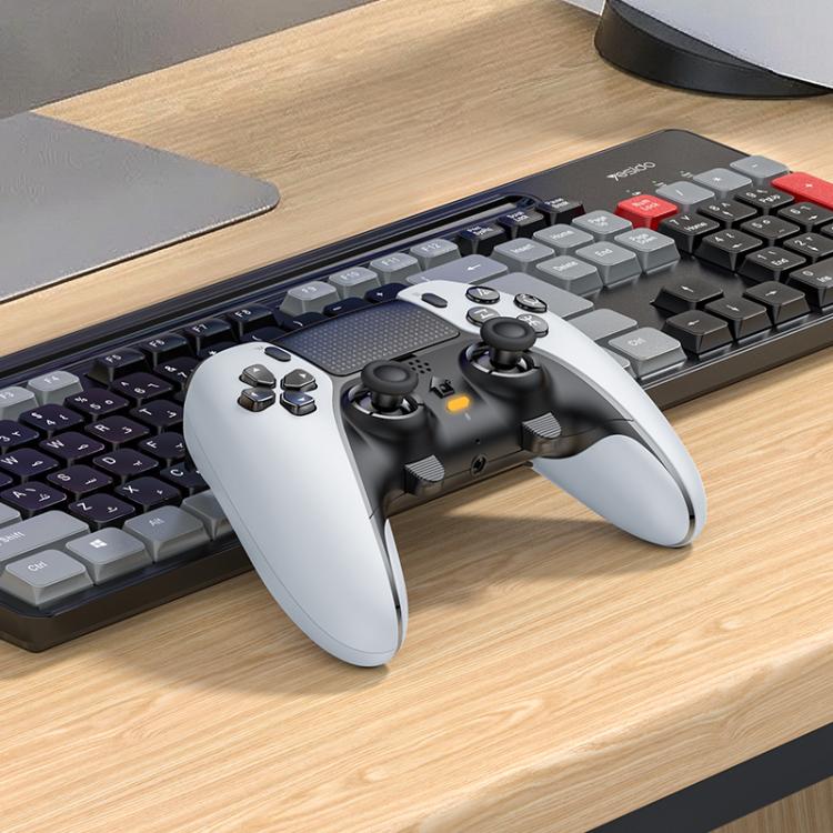 Wireless game controller with gray grips, thumbsticks, and shoulder triggers