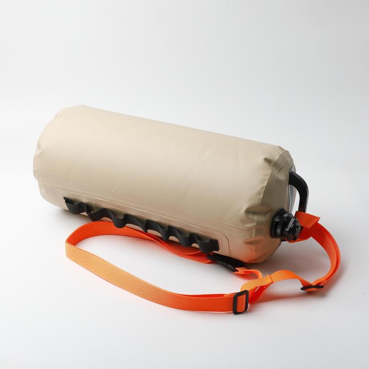 Khaki water storage bag with orange carry strap and black valve cap