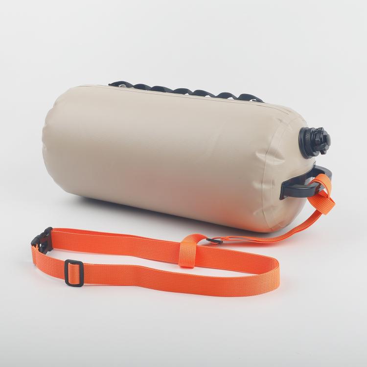 Khaki water storage bag with orange shoulder strap and black valve cap