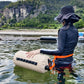 Khaki outdoor water storage bag with orange straps and black valve caps