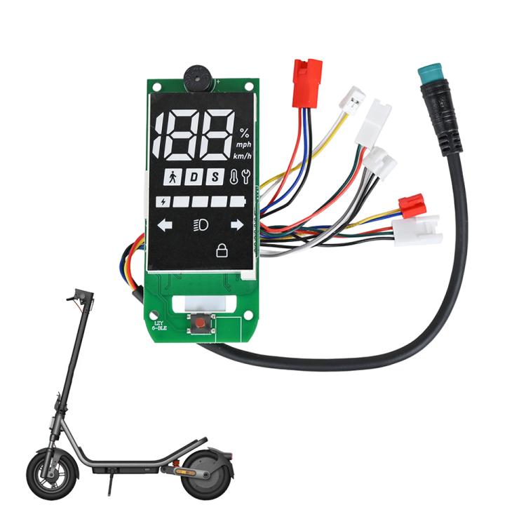 Green scooter dashboard display circuit board with LCD screen, buttons, and wiring connectors