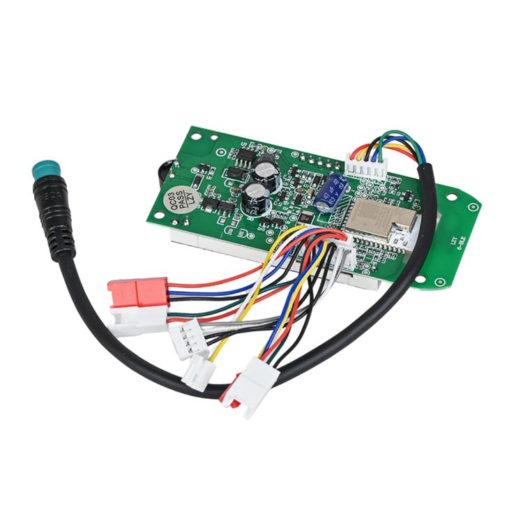 Green dashboard controller circuit board with ICs, capacitors, and multi-wire harness