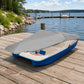 Pedal boat cover with gray top fabric over blue pedal boat with beige deck
