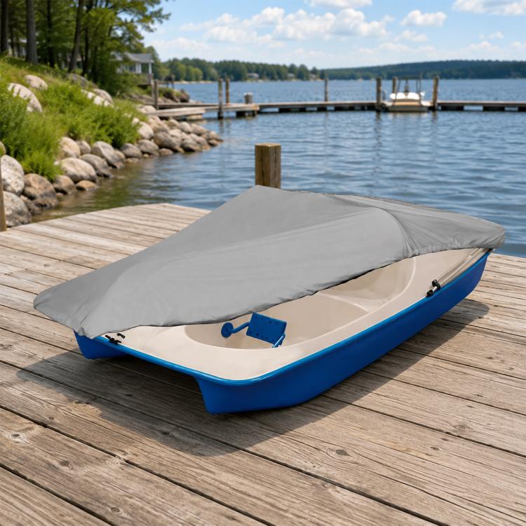 Pedal boat cover with gray top fabric fitted over a blue pedal boat deck