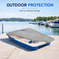 Grey pedal boat cover laid over blue pedal boat on a wooden dock