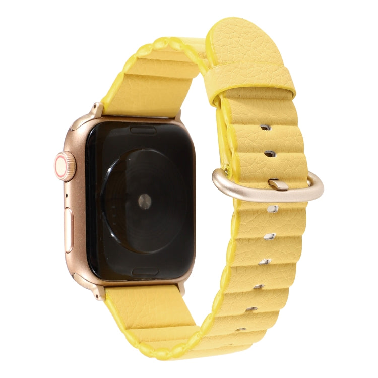 Yellow Apple Watch with matching loop-stripe replacement strap and iron buckle