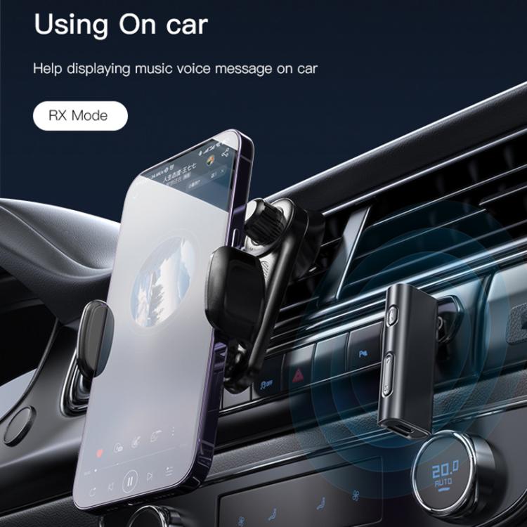 Black 3.5mm AUX Bluetooth adapter in car AUX setup, RX Mode label