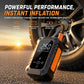 Portable electric tire inflator standing on asphalt with illuminated digital screen