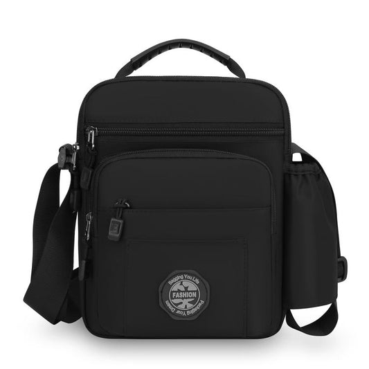 Black men's crossbody bag with zip front pocket and adjustable shoulder strap