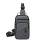 Grey crossbody chest bag with front zipper pocket and adjustable shoulder strap