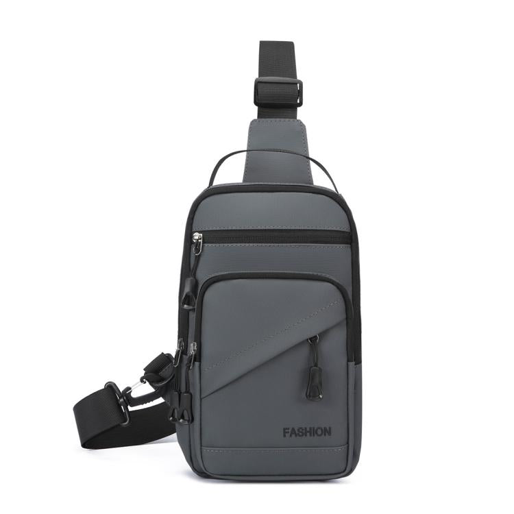 Grey crossbody chest bag with front zipper pocket and adjustable shoulder strap