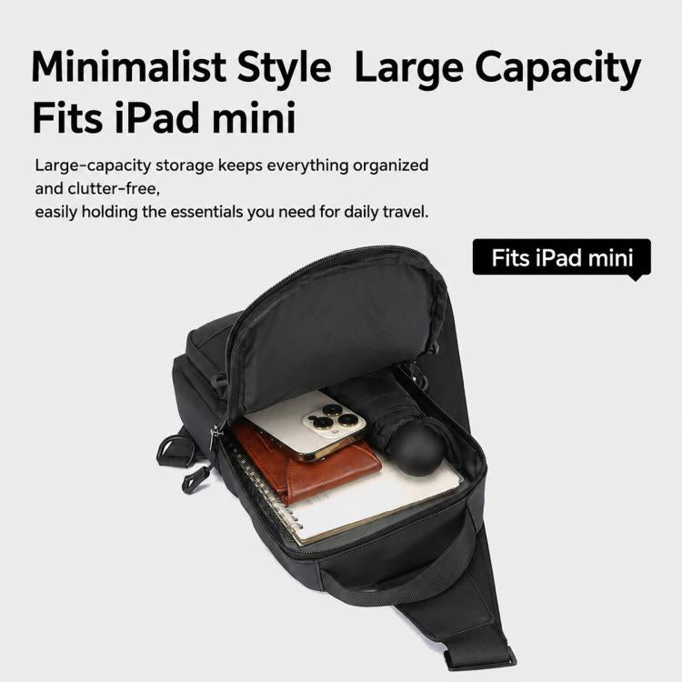 Black crossbody chest bag open view with storage compartment for phone and iPad mini