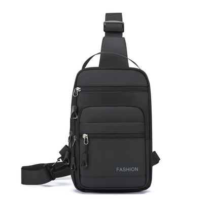 Black crossbody chest bag with top handle strap, front zip pocket, and adjustable webbing strap