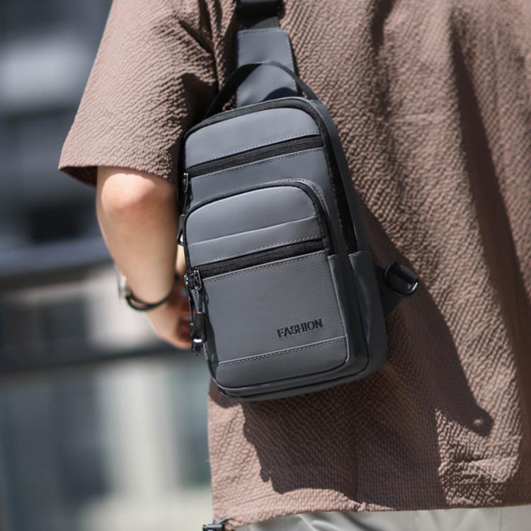Men's grey waterproof crossbody chest bag with zip front pockets and adjustable strap