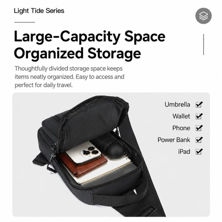 Men's black crossbody chest bag, open view showing spacious main compartment and zip fronts