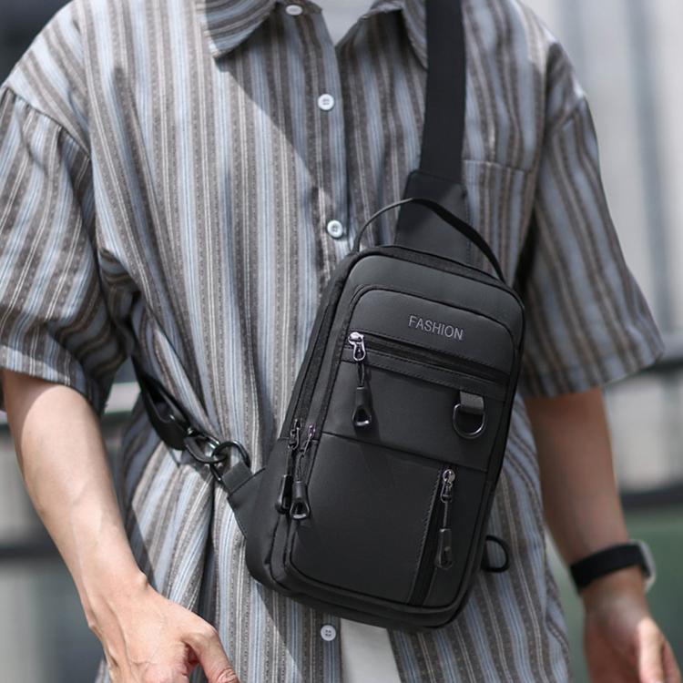 Men's black crossbody chest bag with multiple front zippers and detachable strap hook