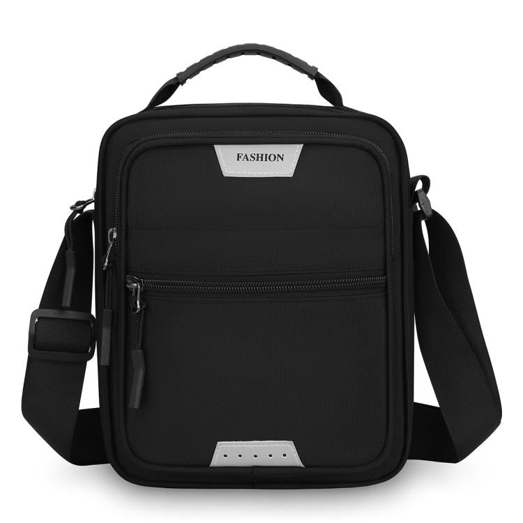 Men’s large crossbody bag in black, with two zip compartments and adjustable shoulder strap