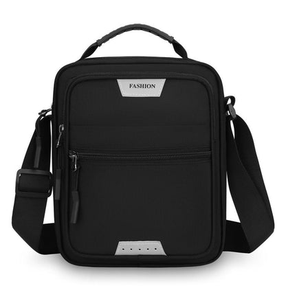 Men’s large crossbody bag in black, with two zip compartments and adjustable shoulder strap