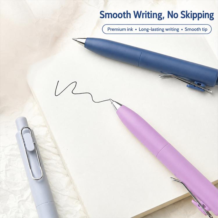 Blue and purple retractable pocket ballpoint pens with smooth bullet tips and clips