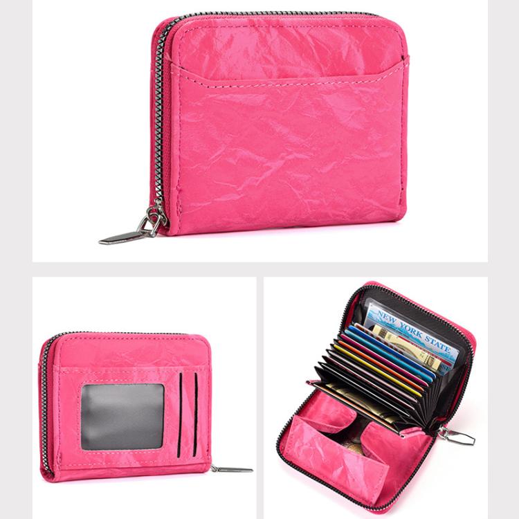 Pink card coin zipper wallet, side view with zipper pull and multi-slot interior.